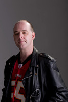 male "studio portrait" "grey background"