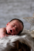 "new born baby yawning"