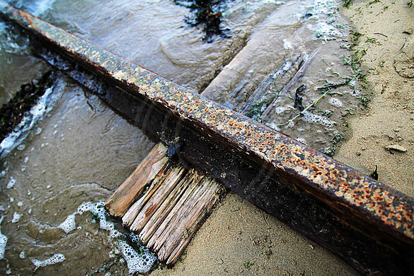 tide water texture rust rail wood sand