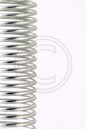 Steel spring on a white background